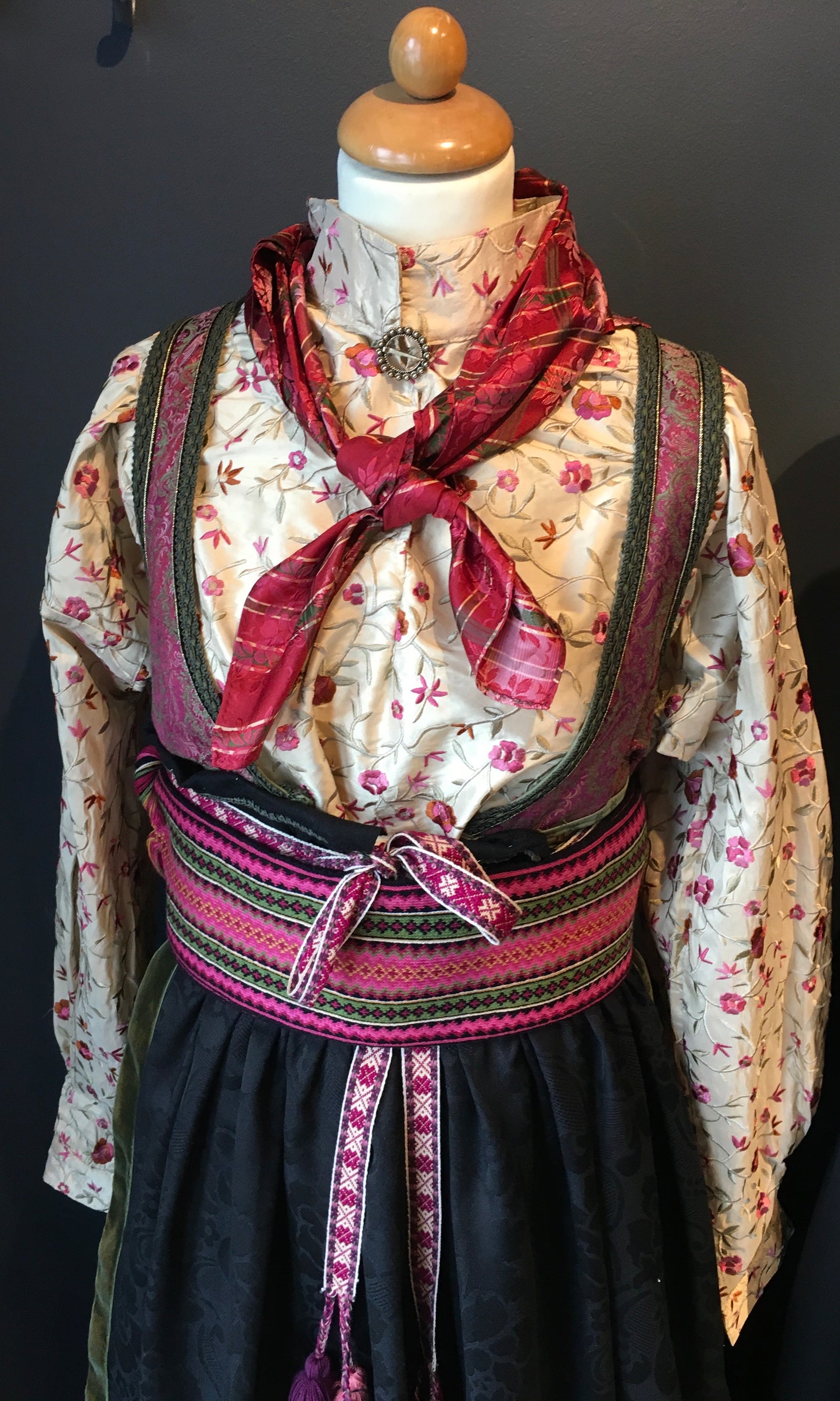 Beltestakk i rosa og lilla.