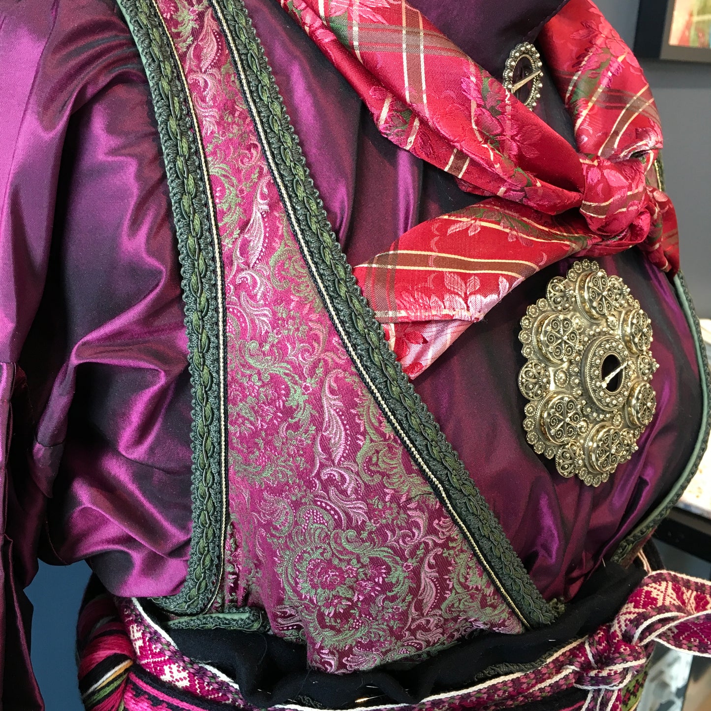 Beltestakk i rosa og lilla.