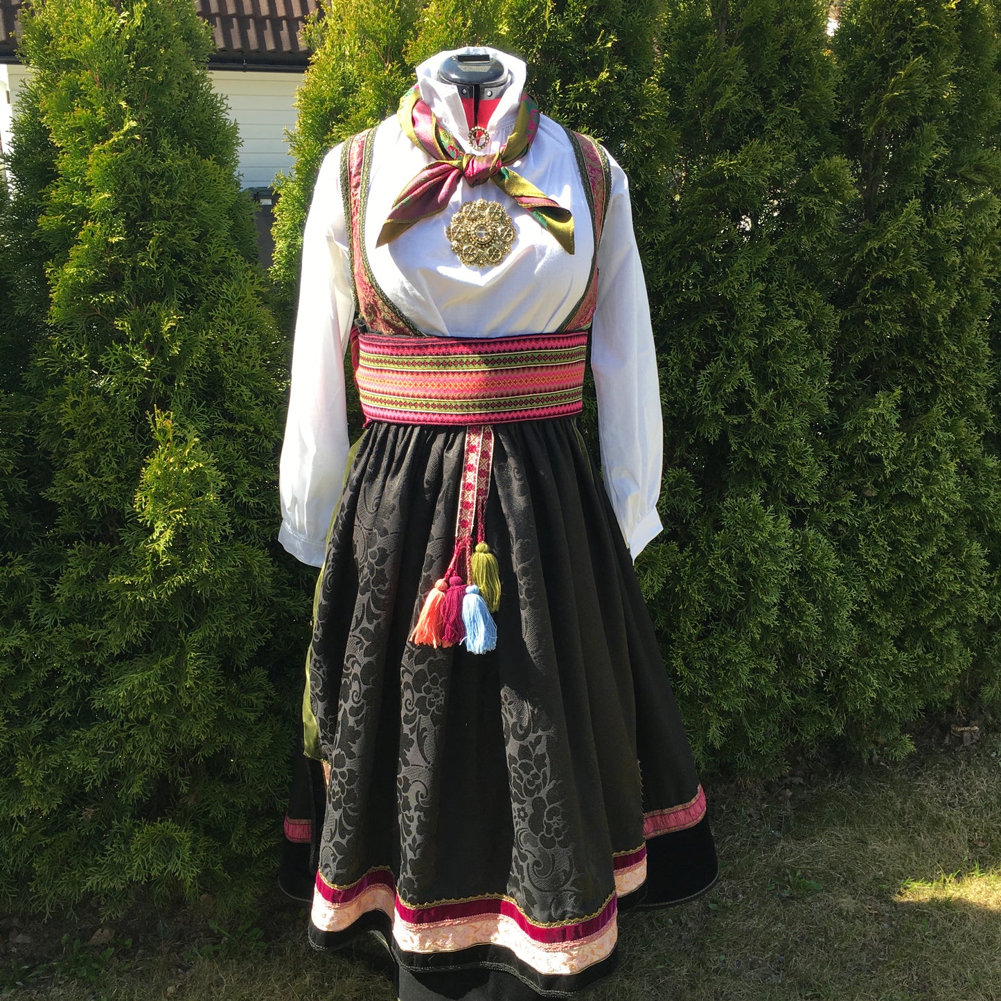 Beltestakk i rosa og lilla.